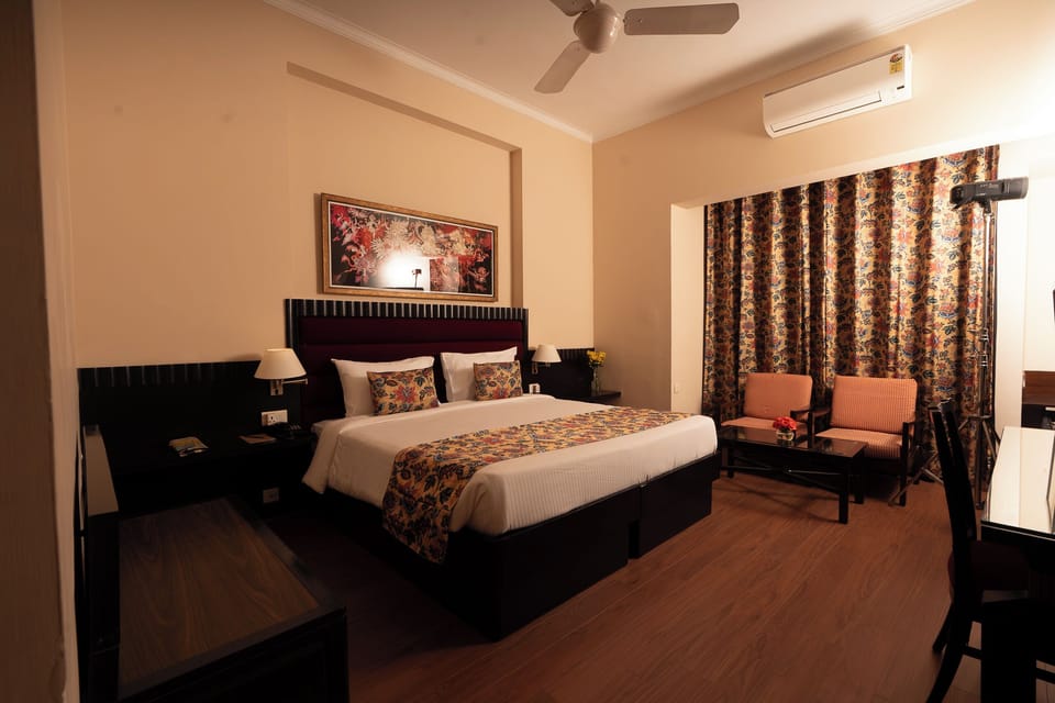 Deluxe Double Room, City View | Iron/ironing board, free WiFi, bed sheets