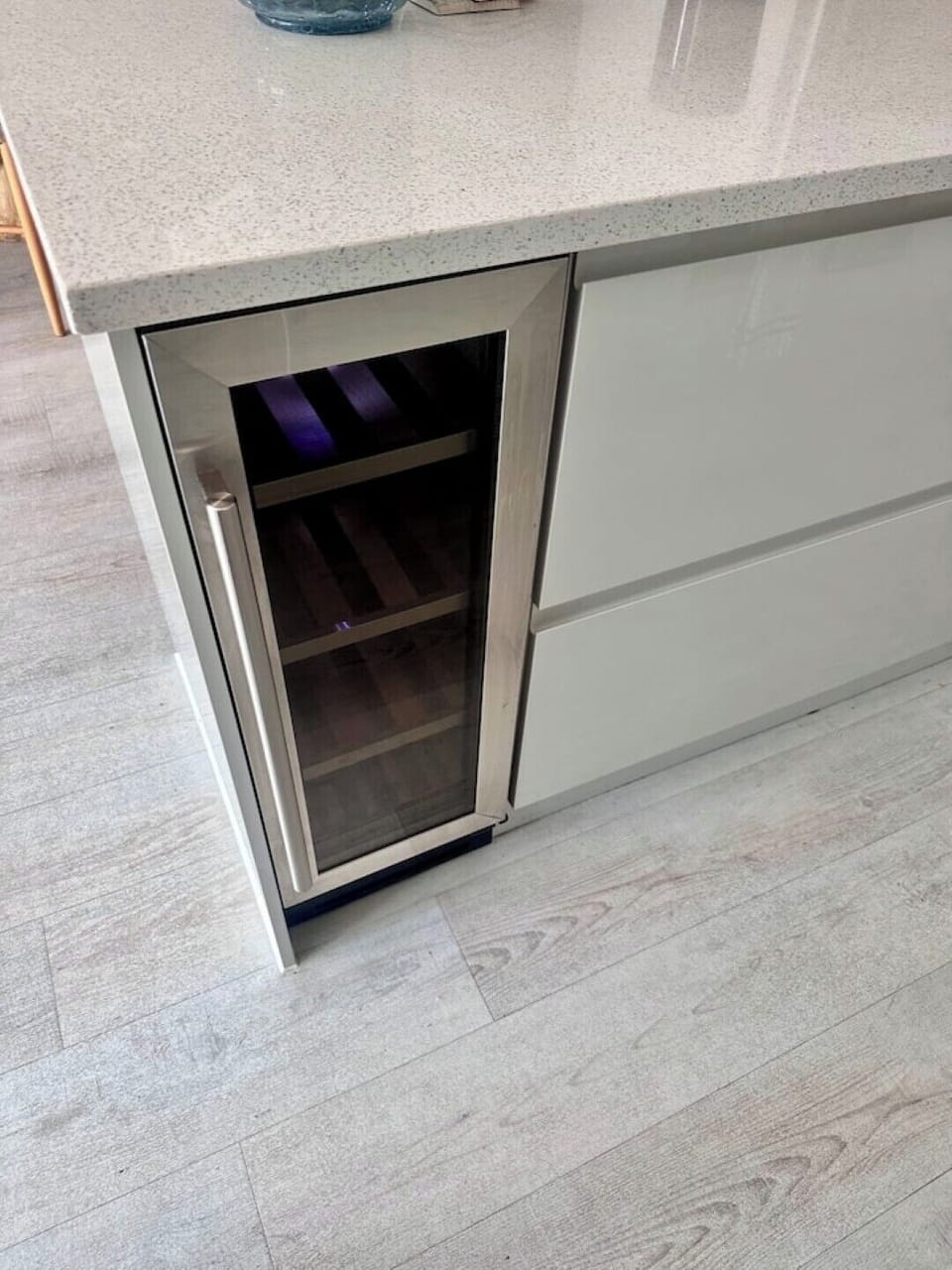 Kitchen which includes wine fridge