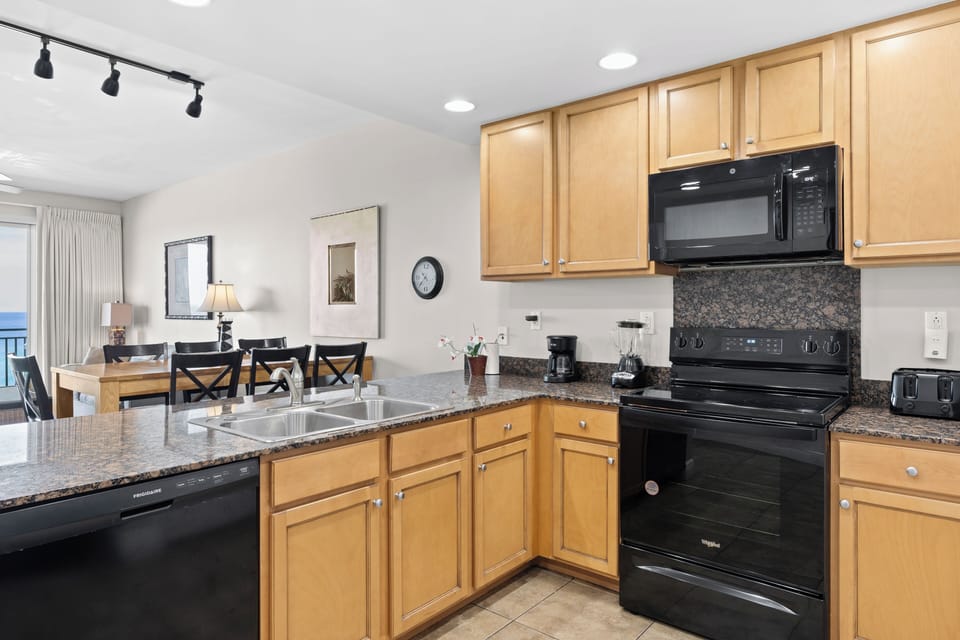 Unit 506: Fully stocked kitchen with modern appliances.