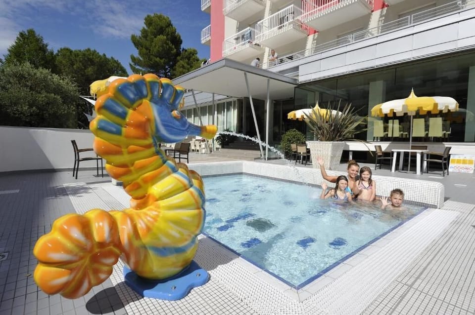 Seasonal outdoor pool, pool umbrellas, sun loungers
