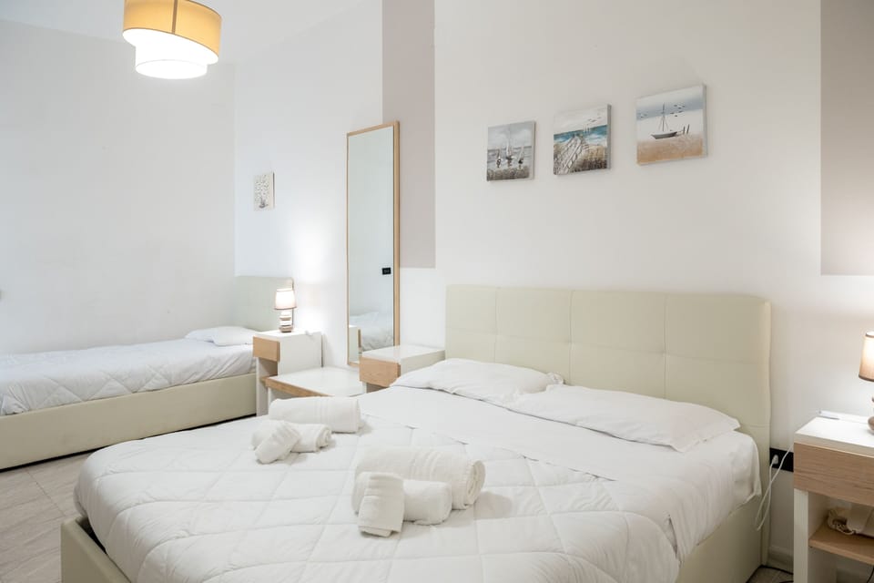Triple Room | Minibar, in-room safe, desk, cribs (surcharge)