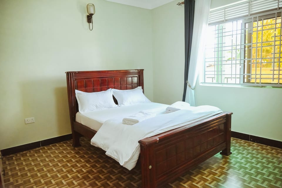 Comfort Apartment, Garden View | Laptop workspace, iron/ironing board, free WiFi
