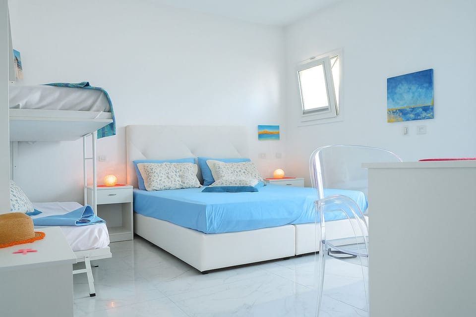 Quadruple Room | In-room safe, free WiFi, bed sheets