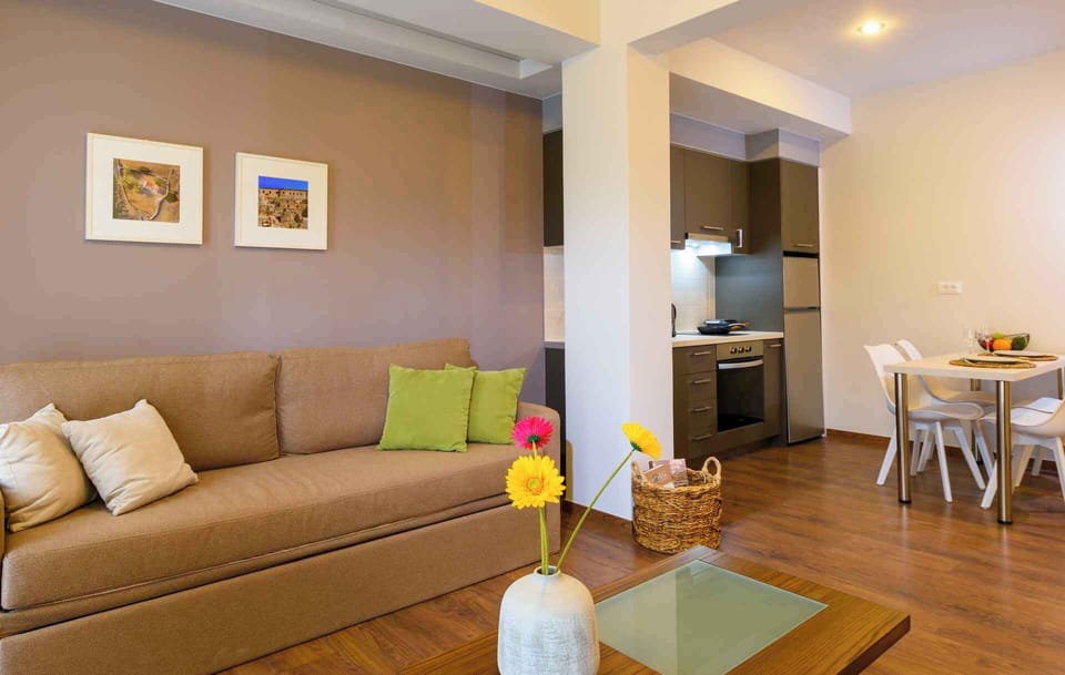 Comfort Apartment, 1 Bedroom, Garden View | Living area | 32-inch Smart TV with satellite channels