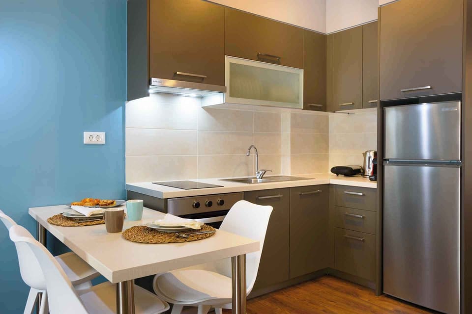 Comfort Apartment, 2 Bedrooms, Balcony, Partial Sea View | Private kitchen | Stovetop, espresso maker, toaster, highchair