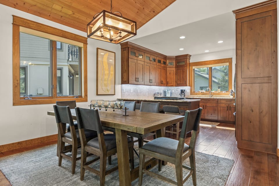 Dining Area & Kitchen in Background