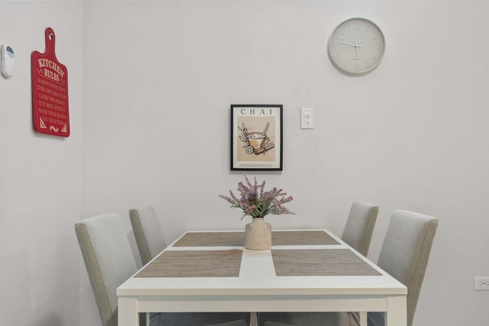 Clean and bright table for dining, work, or games.