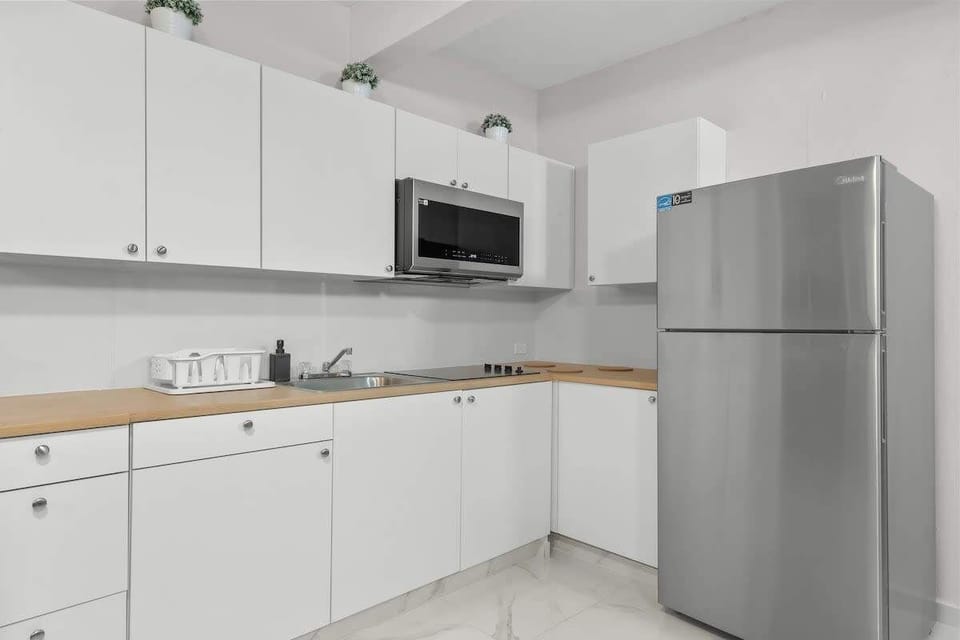 Fully stocked kitchen with new appliances. Cook like home!