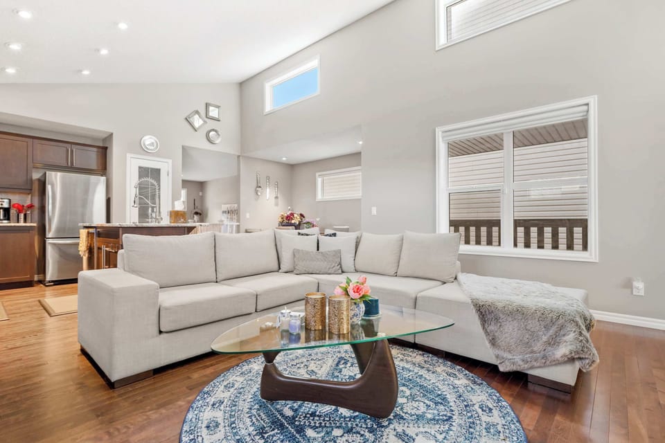 Gather for movie night or Netflix marathons on the comfy sectional couch in the main living room area. 