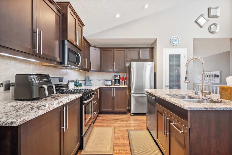 Cook like home with stainless steel appliances, cookware, and essentials.