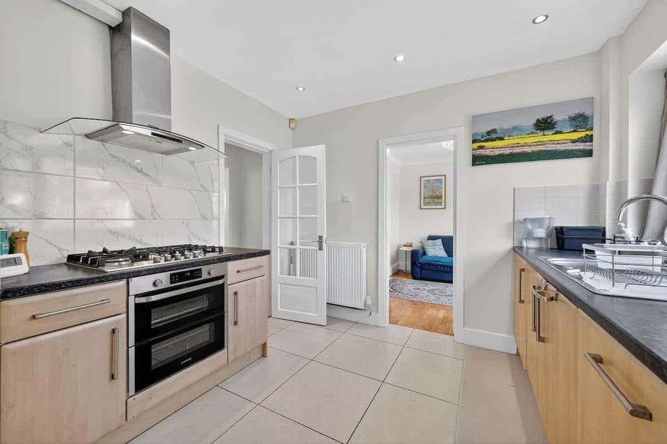 Plenty of worktop space and storage in the kitchen, with direct access to the garden