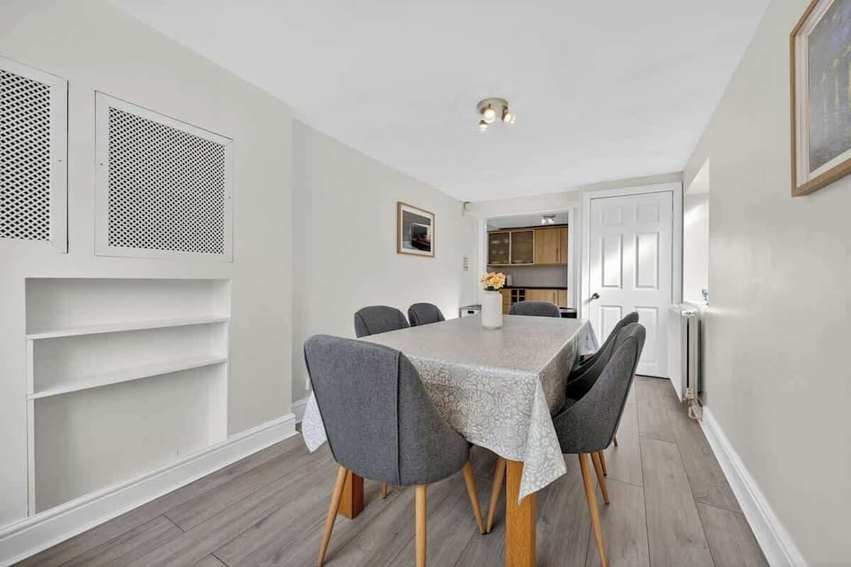 A stylish dining space with seating for the whole group, perfect for home-cooked meals together