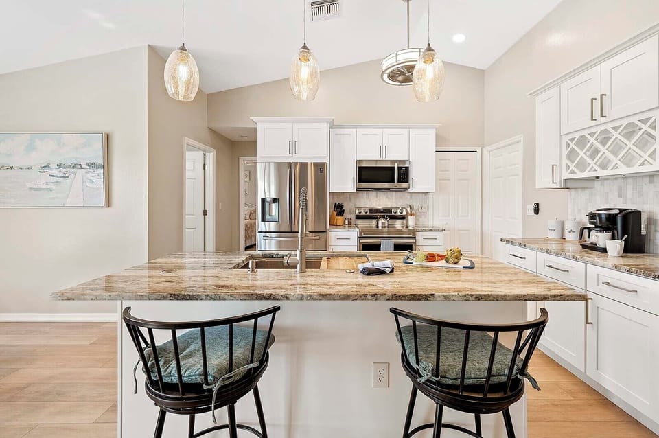Enjoy a Fully Equipped Kitchen with an Island Great for Entertainment