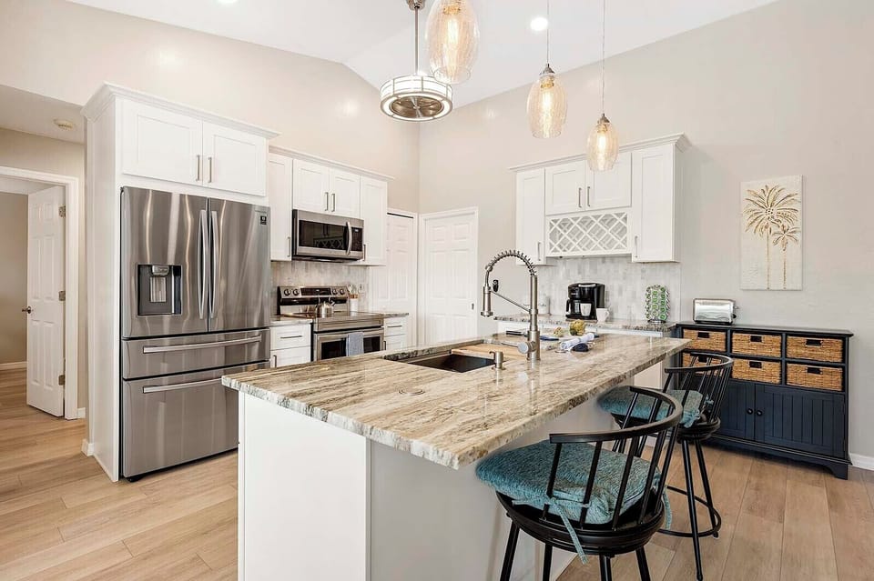 Kitchen with Stainless Appliances and Additional Seating at the Island