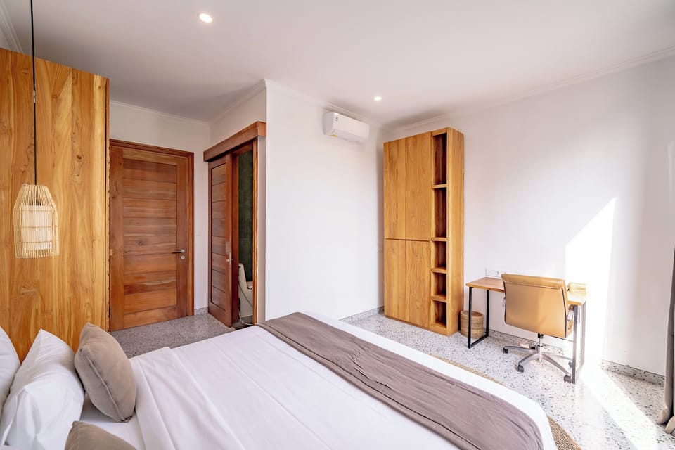 Deluxe Villa, Pool View | In-room safe, desk, laptop workspace, blackout drapes