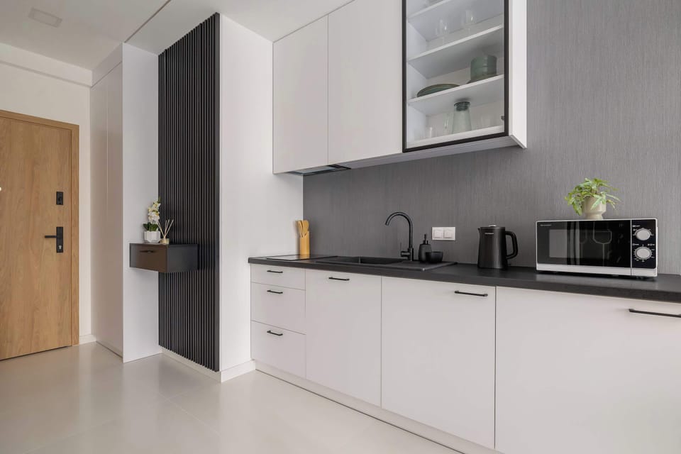 The kitchenette's practical layout maximizes space and functionality.