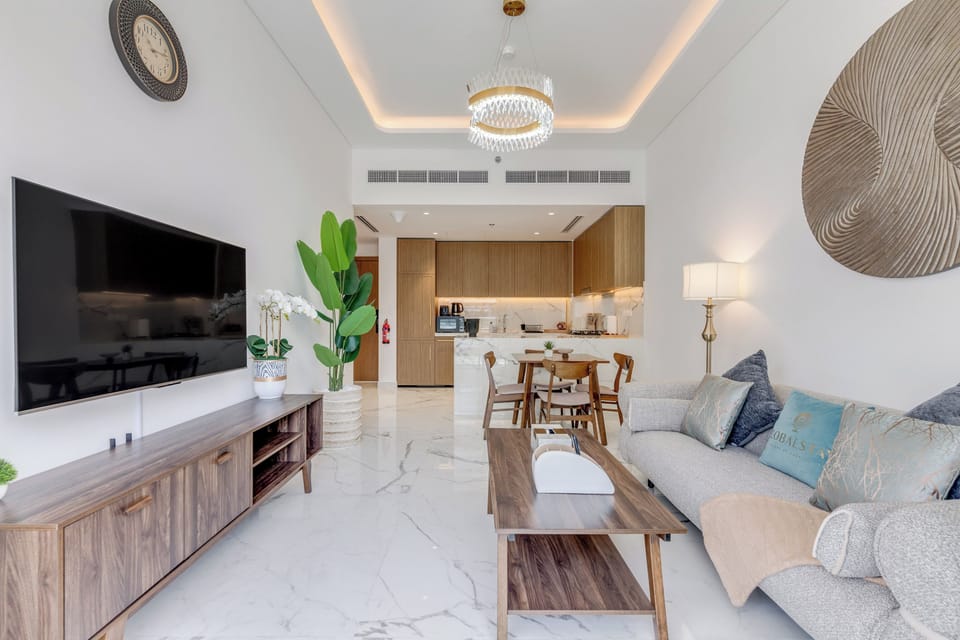 Deluxe Apartment, 1 Bedroom, Balcony | Living area | 43-inch flat-screen TV with digital channels, Netflix
