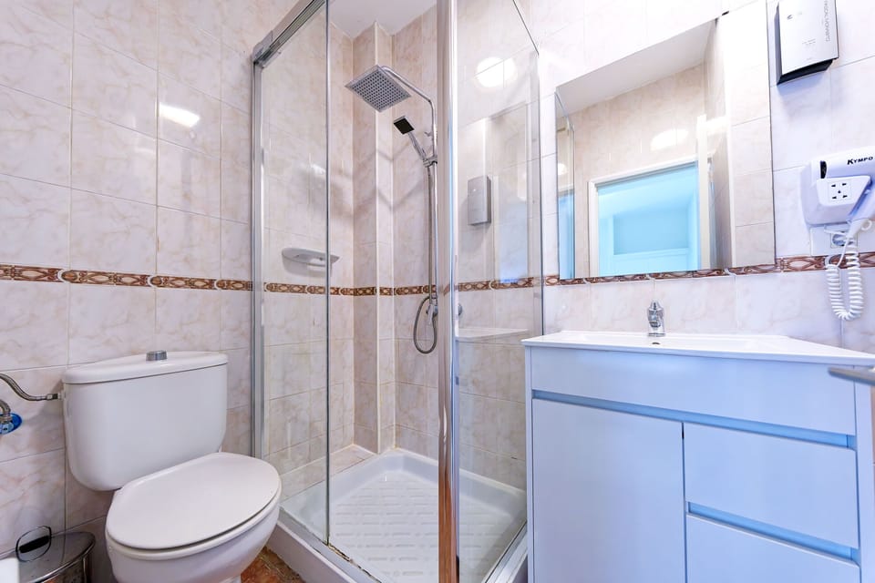 Classic Double Room, City View | Bathroom | Hair dryer, towels, soap, shampoo