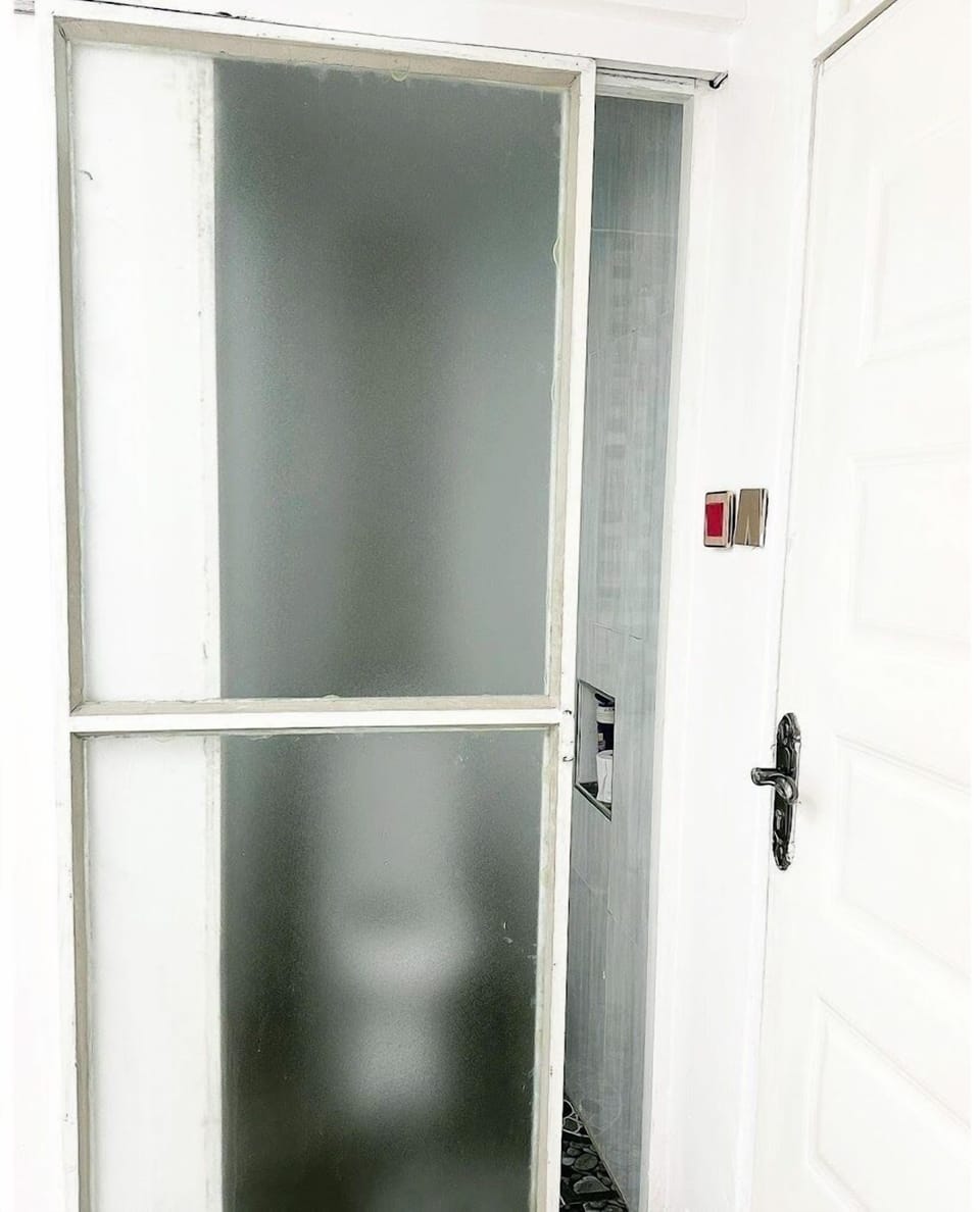 Deluxe Apartment, City View | Bathroom | Shower, free toiletries, slippers, towels