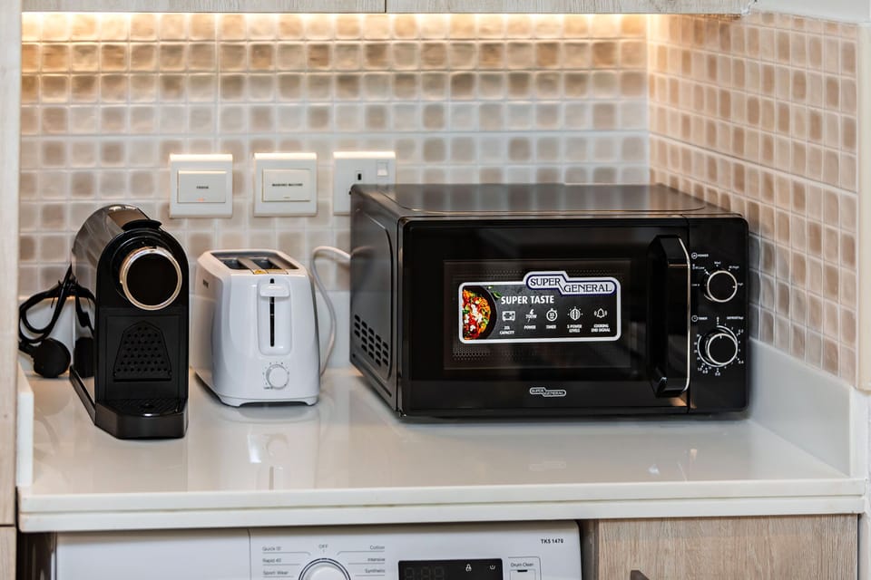 Superior Apartment, 1 Bedroom, Sea View | Private kitchen | Espresso maker, electric kettle, toaster, freezer