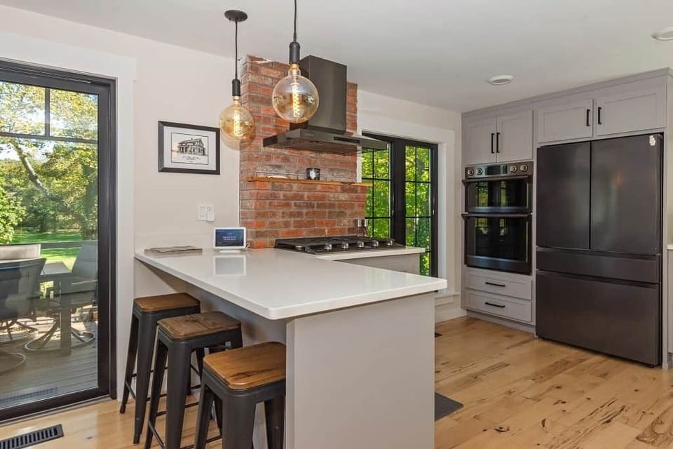 A modern, fully stocked kitchen perfect for extended stays and family cooking.