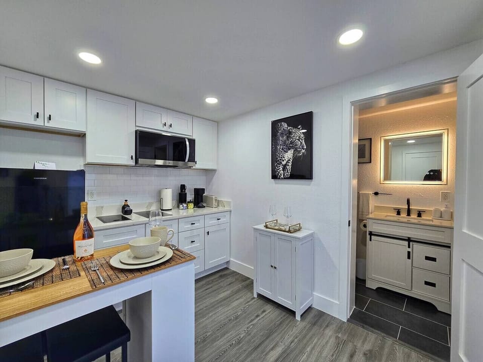 Our kitchenette has all you need for a quick meal or a romantic dinner. It includes a microwave, a small refrigerator, a two-burner stove, and a coffee maker. It`s equipped with all the essentials to make you feel at home.