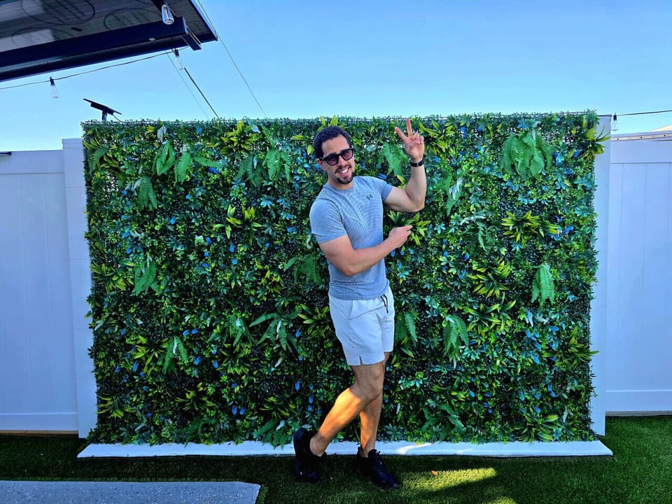 Strike a pose! Our lush green wall is the perfect backdrop for your vacation photos and Instagram memories.