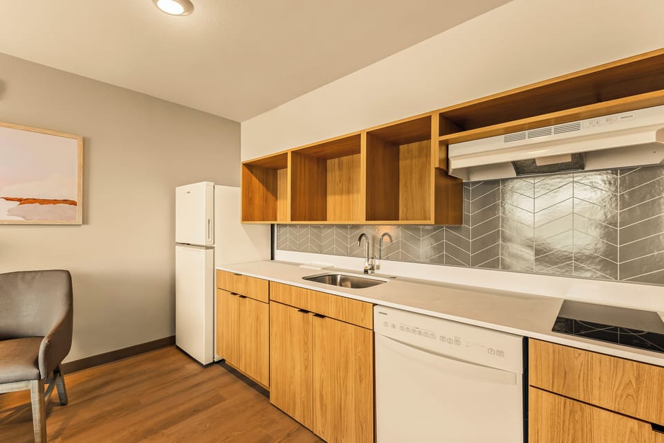 Suite, 1 King Bed, Mobility Accessible, Non Smoking | Private kitchen | Full-size fridge, microwave, stovetop, dishwasher