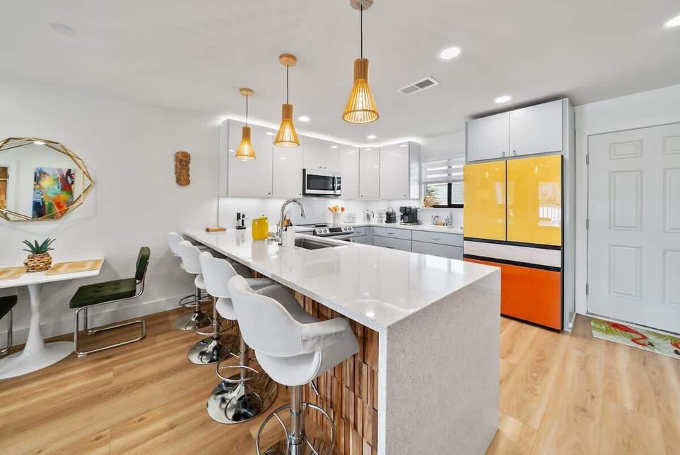 Fully stocked kitchen with a large island.
