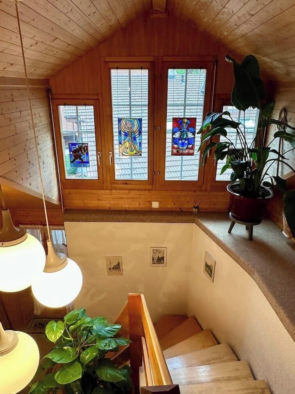 Spotless modern toilet area with thoughtful storage and natural wood finishes