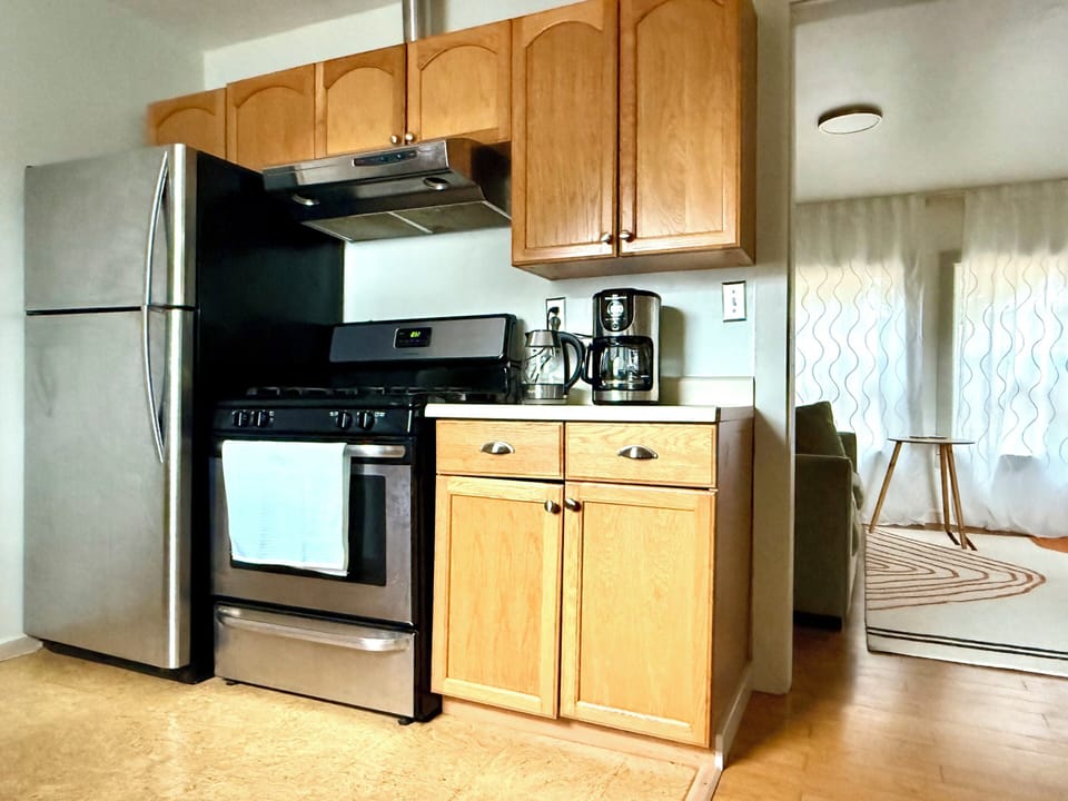 Bright, well-equipped kitchen ready for your home-cooked meal 
