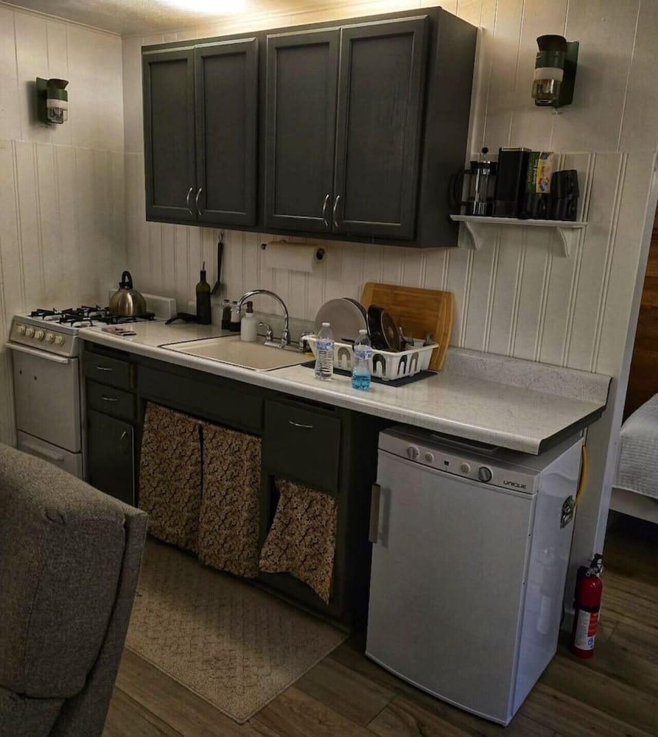 Our kitchenette features a small propane fridge and coffee maker.