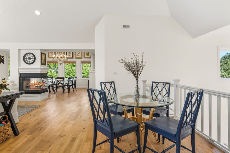 The breakfast nook is a cozy spot to start your day with coffee or casual meals while enjoying the surrounding water views.