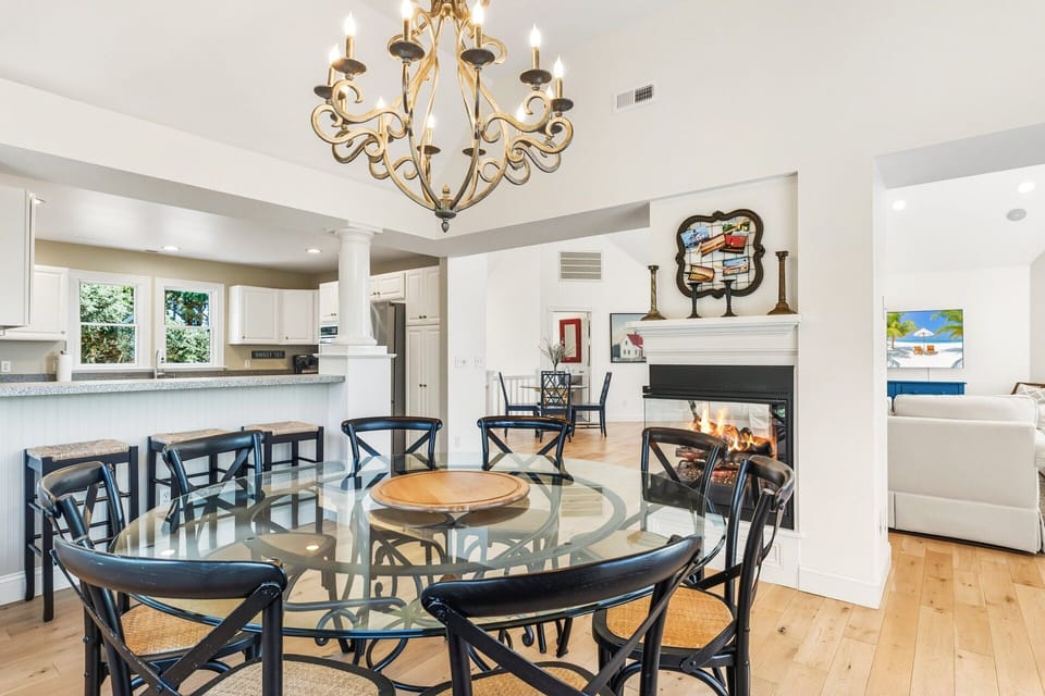 The dining area provides a beautiful setting for meals, with seating for family dinners while enjoying semi-soundfront views.