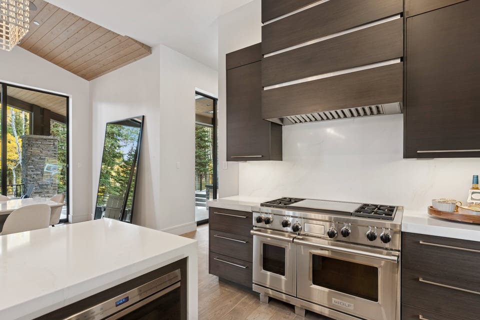 Chef's kitchen with premium stainless steel appliances and sleek cabinetry
