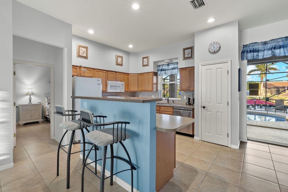 Open Kitchen Concept with Bar for Additional Seating