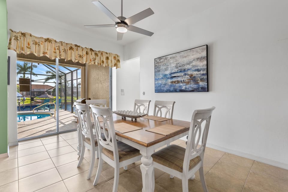 Dining Area with Views of the Pool and Lanai