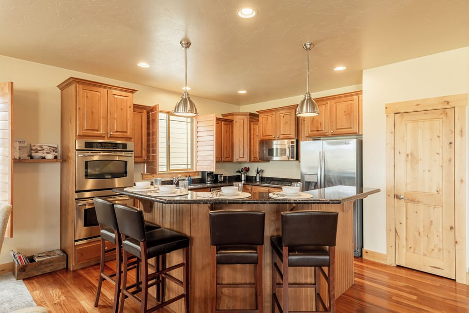 Fully equipped kitchen with modern appliances.
