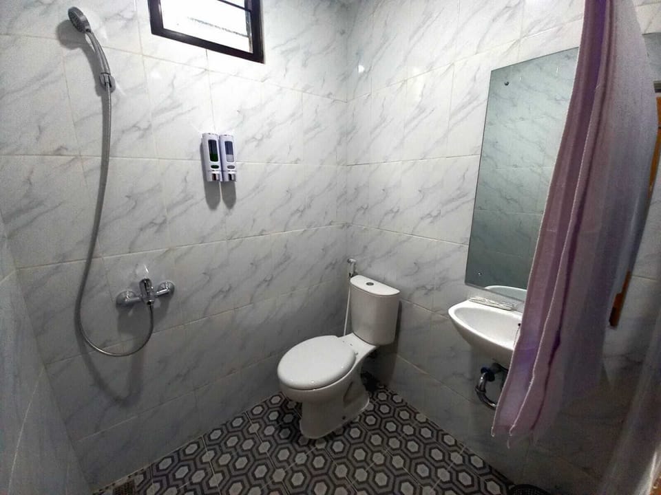 Shower, towels, soap, shampoo