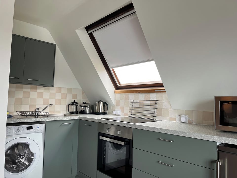 Kitchen area | Schiehallion - Kylesku Lodges, Kylesku, near Lairg