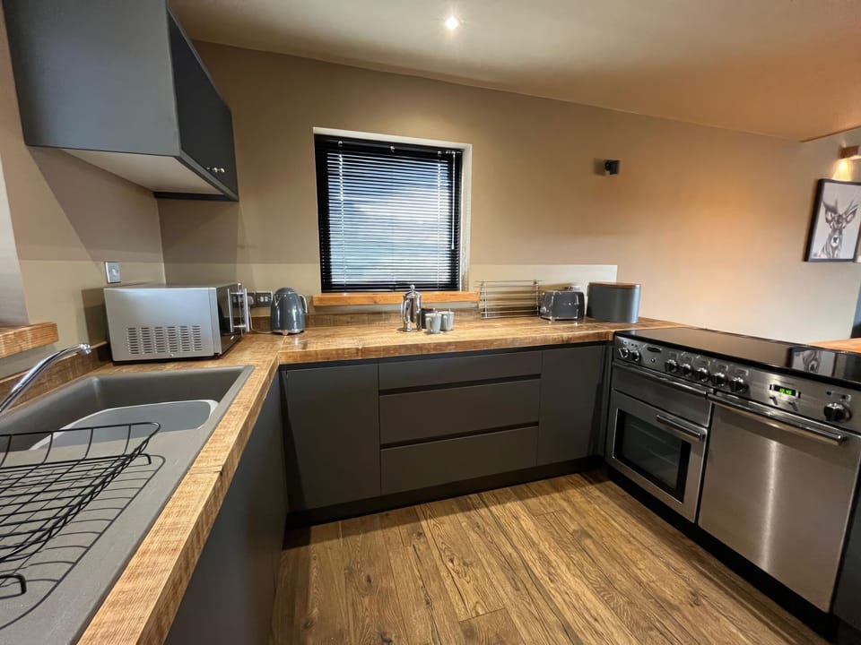 Kitchen area | White Cairn - Kylesku Lodges, Kylesku, near Lairg