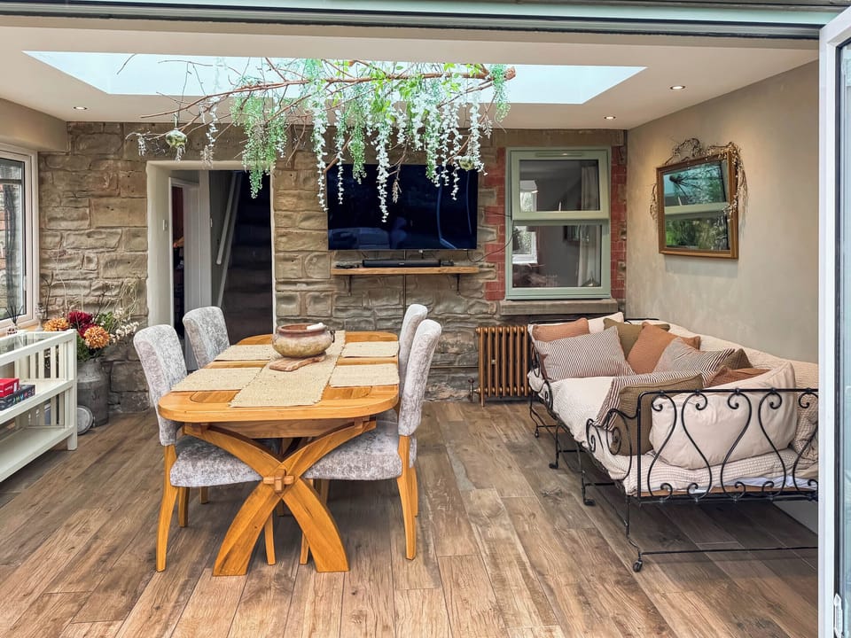 Breakfast/dining area with seating for quiet relaxation | Magnolia Cottage, Coleford
