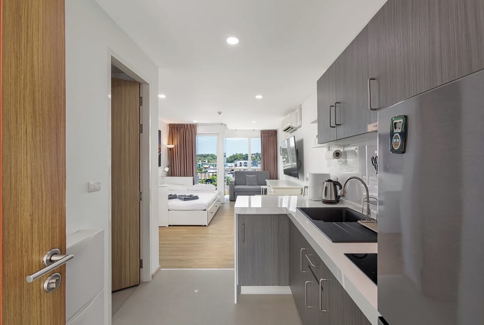 Standard Studio, Balcony, Partial Sea View | In-room safe, blackout drapes, iron/ironing board, free WiFi