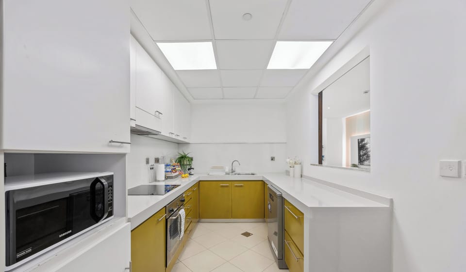 Standard Apartment, Sea View | Private kitchen | Full-size fridge, microwave, oven, stovetop