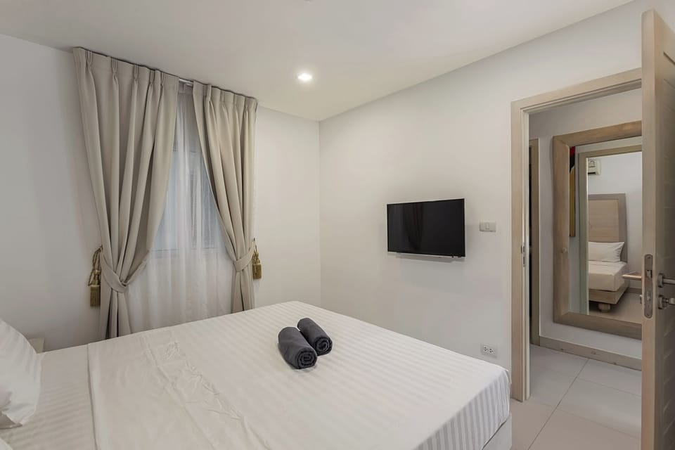 Standard Condo, Balcony, Sea View | In-room safe, blackout drapes, iron/ironing board, free WiFi