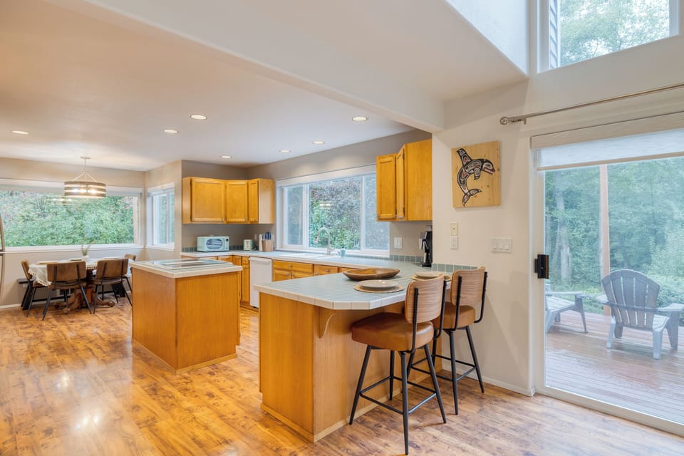 Kitchen with breakfast bar seating.