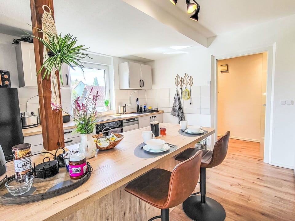 Furniture, Interior Design, Flooring, Wood, Countertop, Kitchen, Floor, Chair, Apartment, Home