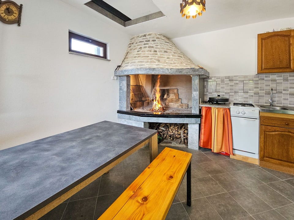 Furniture, Ceiling, Interior Design, Room, Hearth, Natural Material, Chair, Hardwood, Tile, Wood Stain