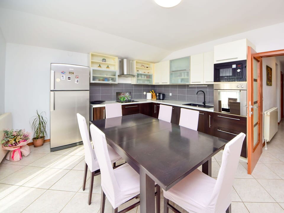 Furniture, Flooring, Interior Design, Kitchen, Floor, Table, Chair, Kitchen Appliance, Ceiling, Kitchen & Dining Room Table