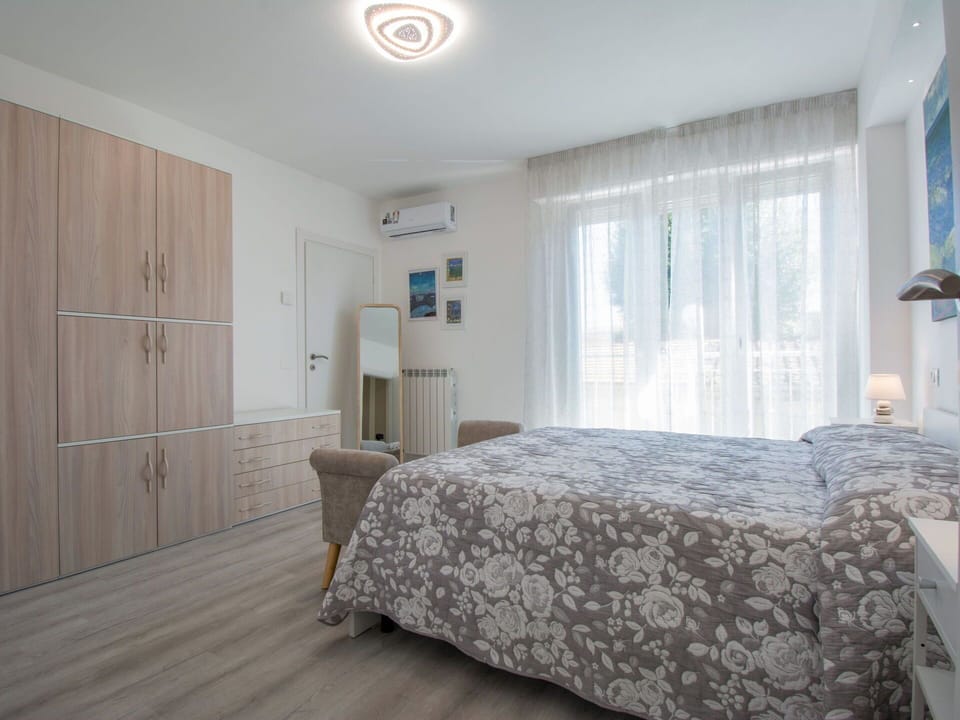Furniture, Interior Design, Bed, Bedroom, Floor, Flooring, Bed Sheet, Bedding, Wood, Ceiling